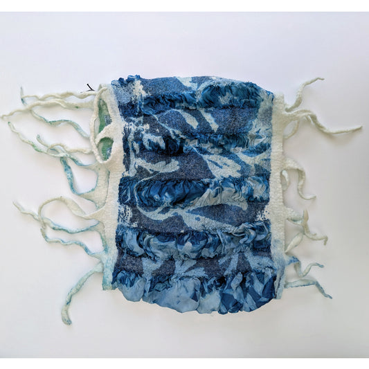 Cowl with long, wavy tassels - blue seaweed cyanotype print on white wool.
