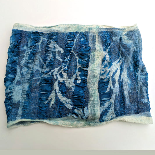 Textured blue silk with cream coloured wool and seaweed print
