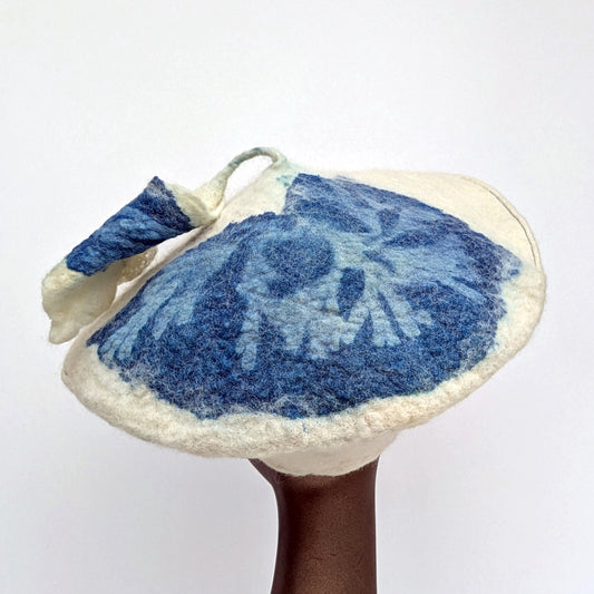 Cyanotype print of Bladder Seaweed Wrack on Silk Chiffon, Nunofelted onto cream-coloured Irish wool beret.