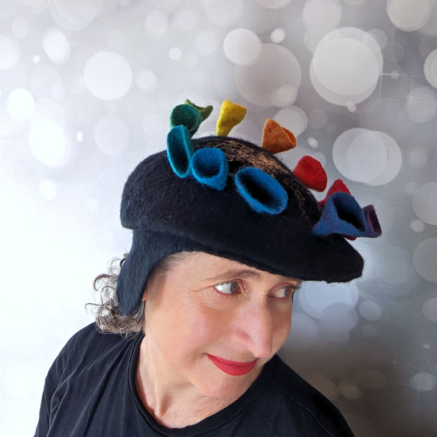 Black Felted Newsboy Cap with Rainbow Fungi -threequartersview