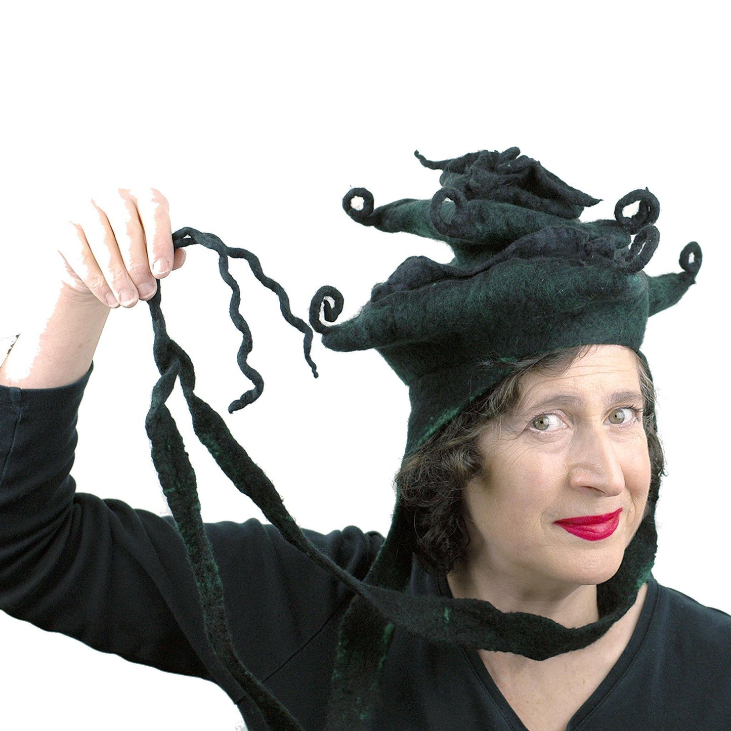 Fantasy Felted Pagoda Hat with Corner Curlicues - front view holding ties