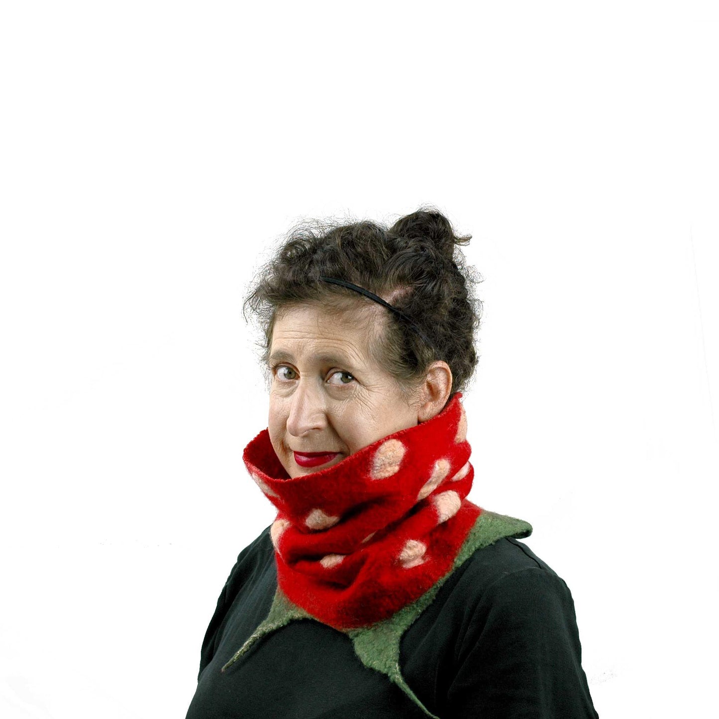 Whimsical Red Strawberry Neck Warmer with Green Leaves worn with wooly side out.