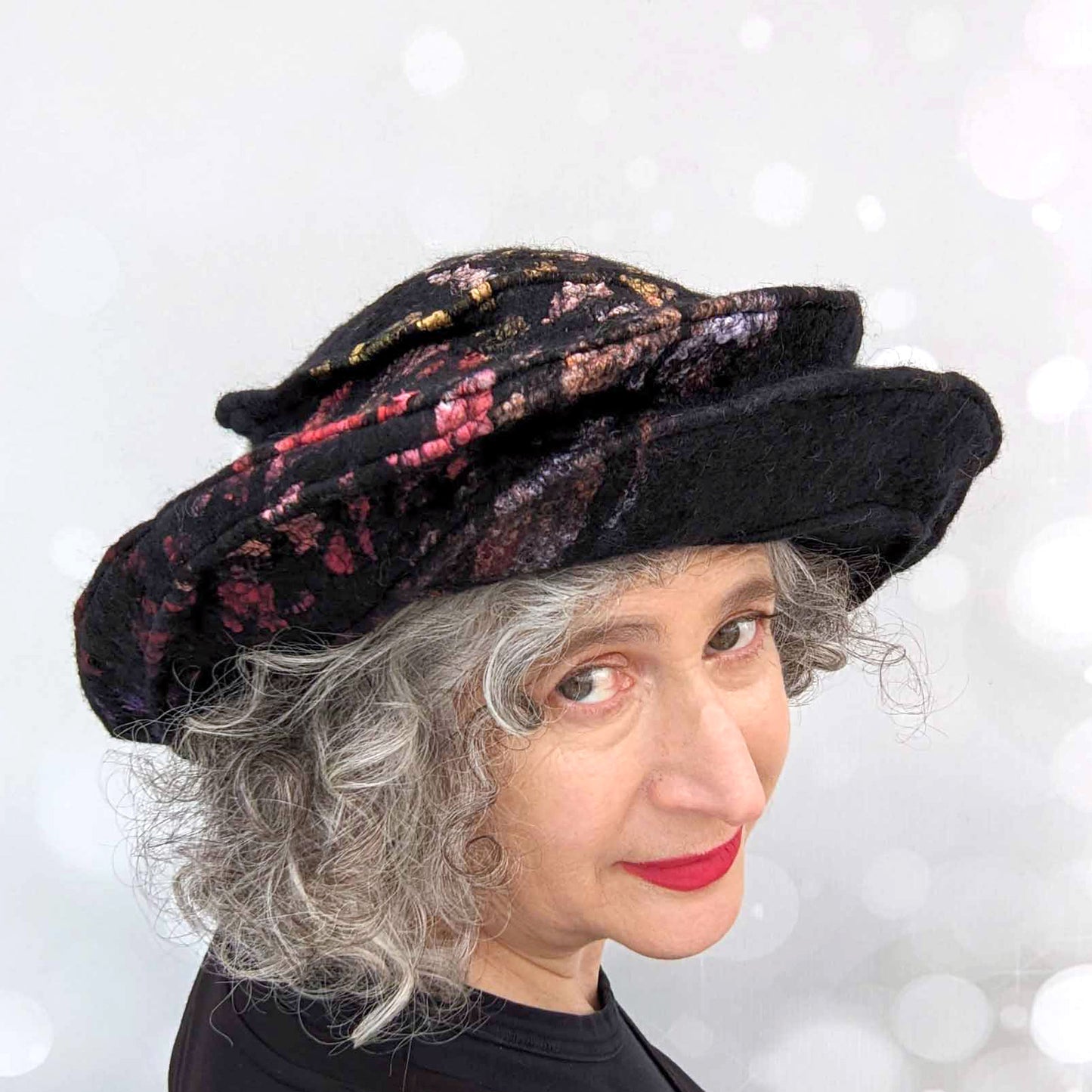 Wide Brimmed Black Hat with Stained Glass Inspired Decoration -threequartersview