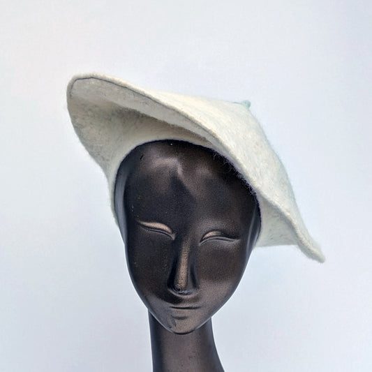 Felted White Beret with angle worn on mannequin - front view