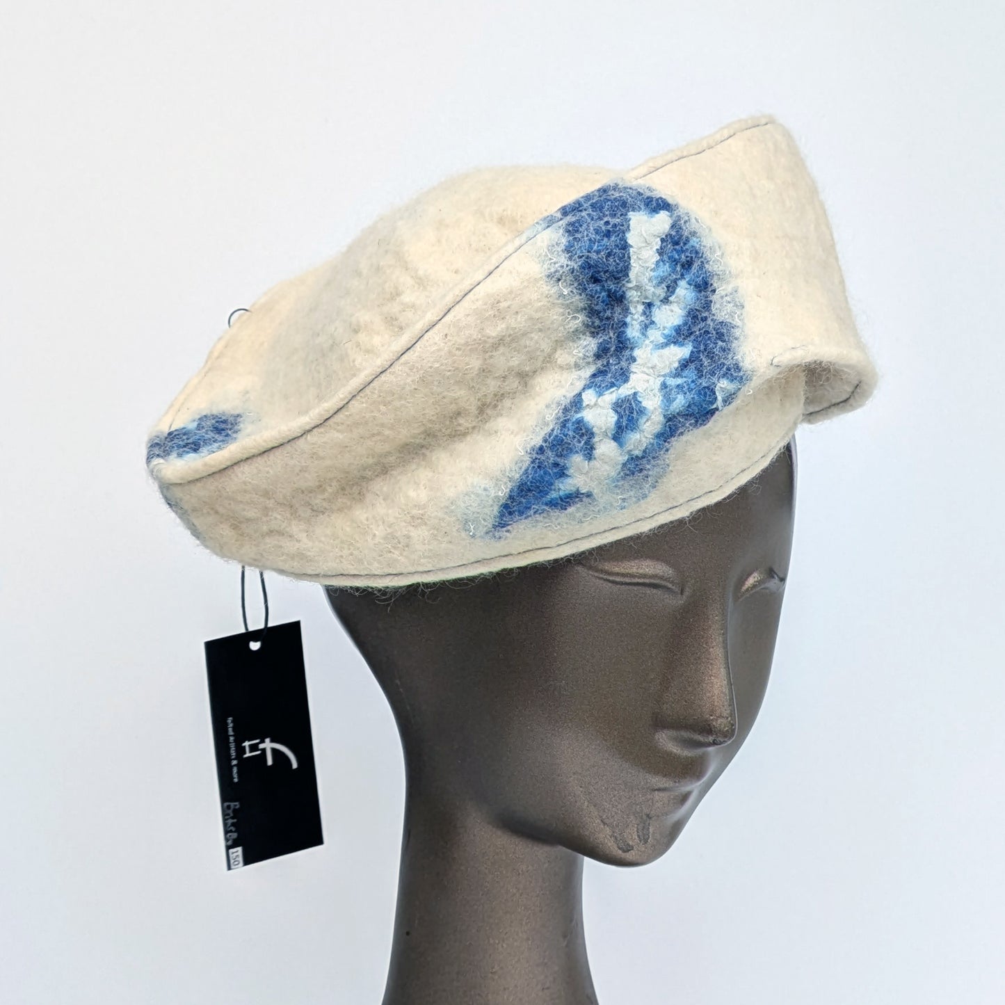 Cream and blue fascinator with brim