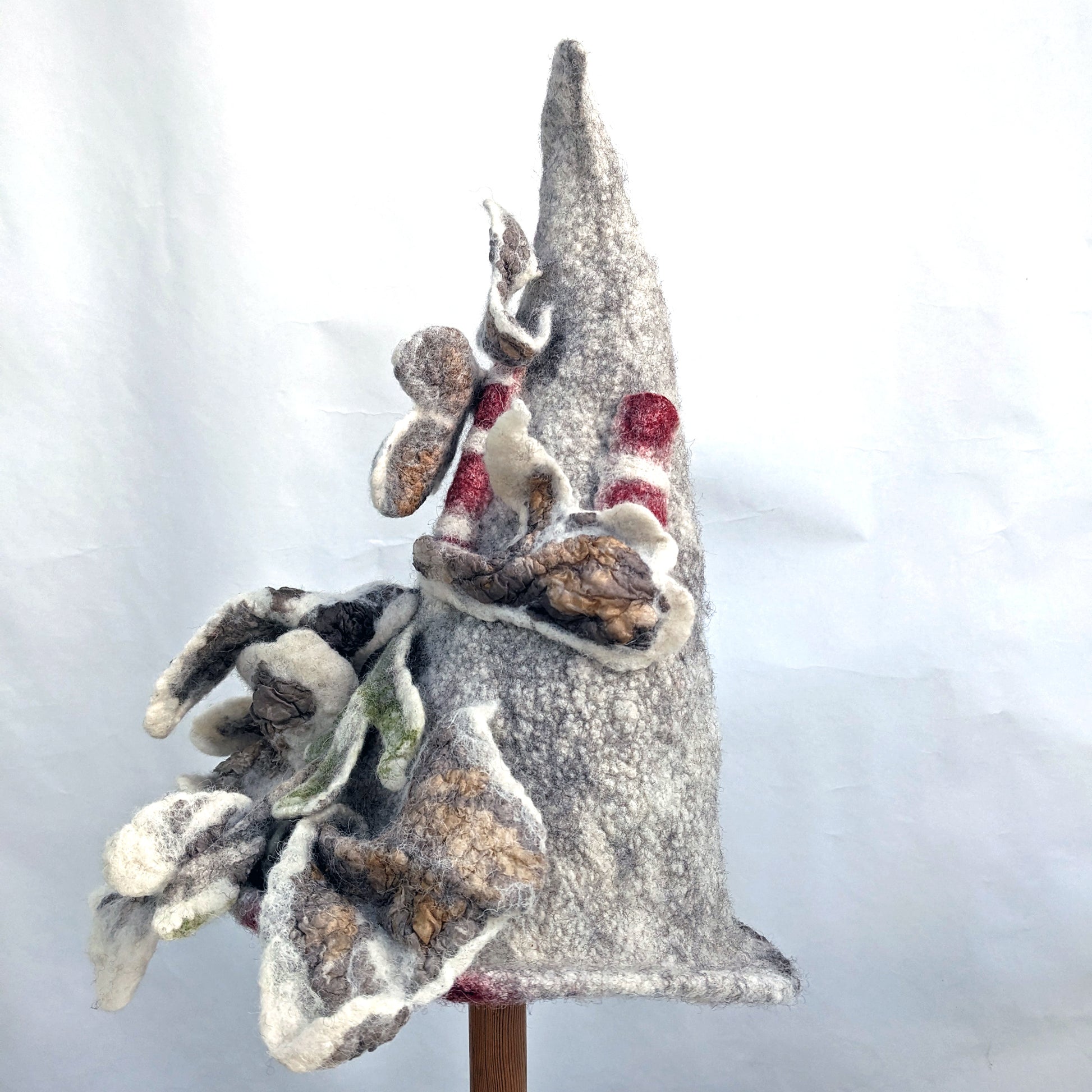Pointy witch hat with two red and white striped Chimneys - Poolbeg - Dublin Ireland. Side view