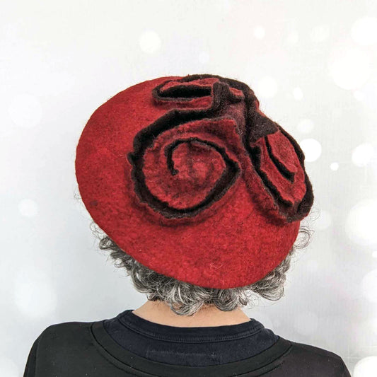 Felted Red Beret with Triskele Motif - back view