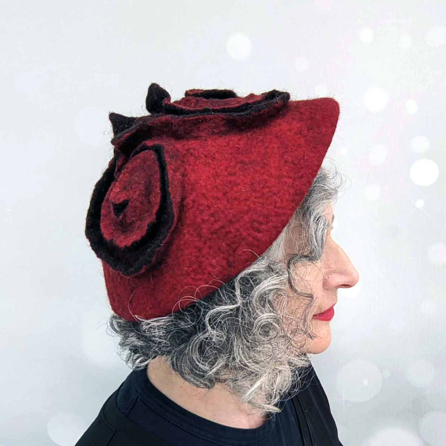 Felted Red Beret with Triskele Motif - side view