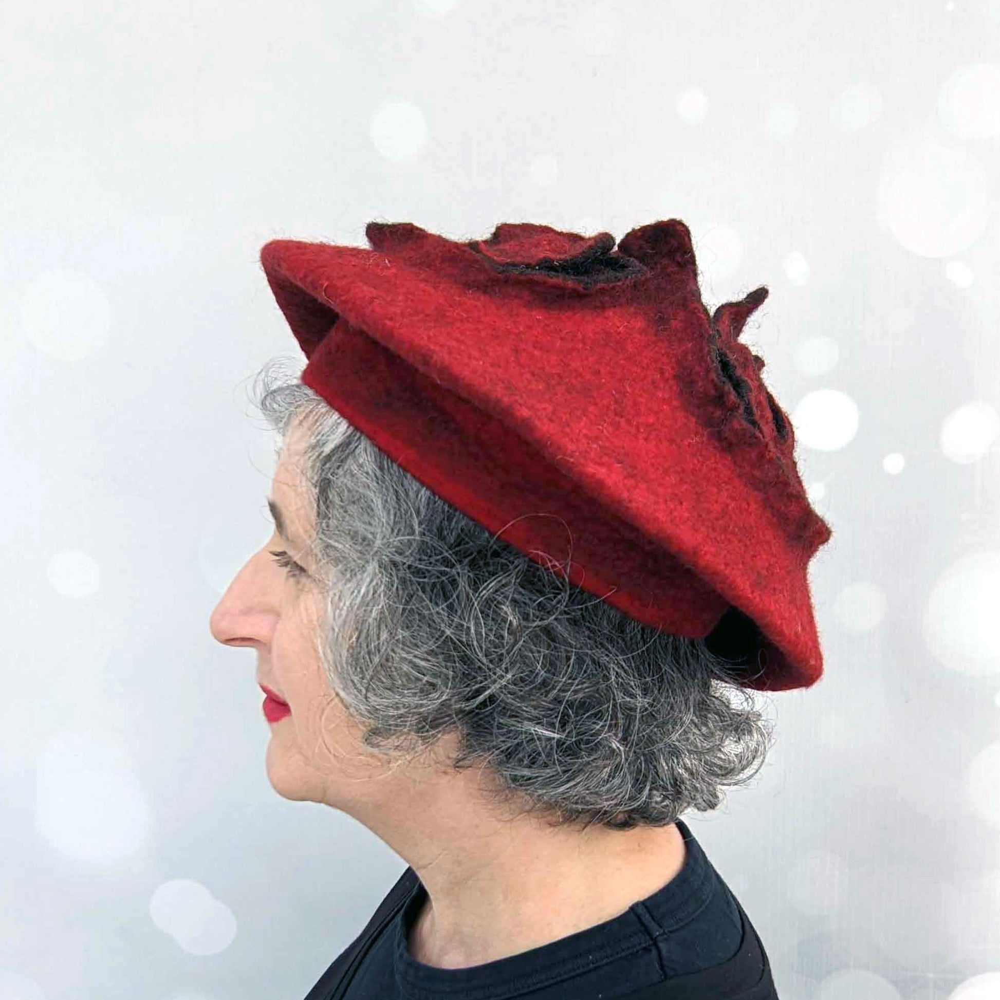 Felted Red Beret with Triskele Motif - side view