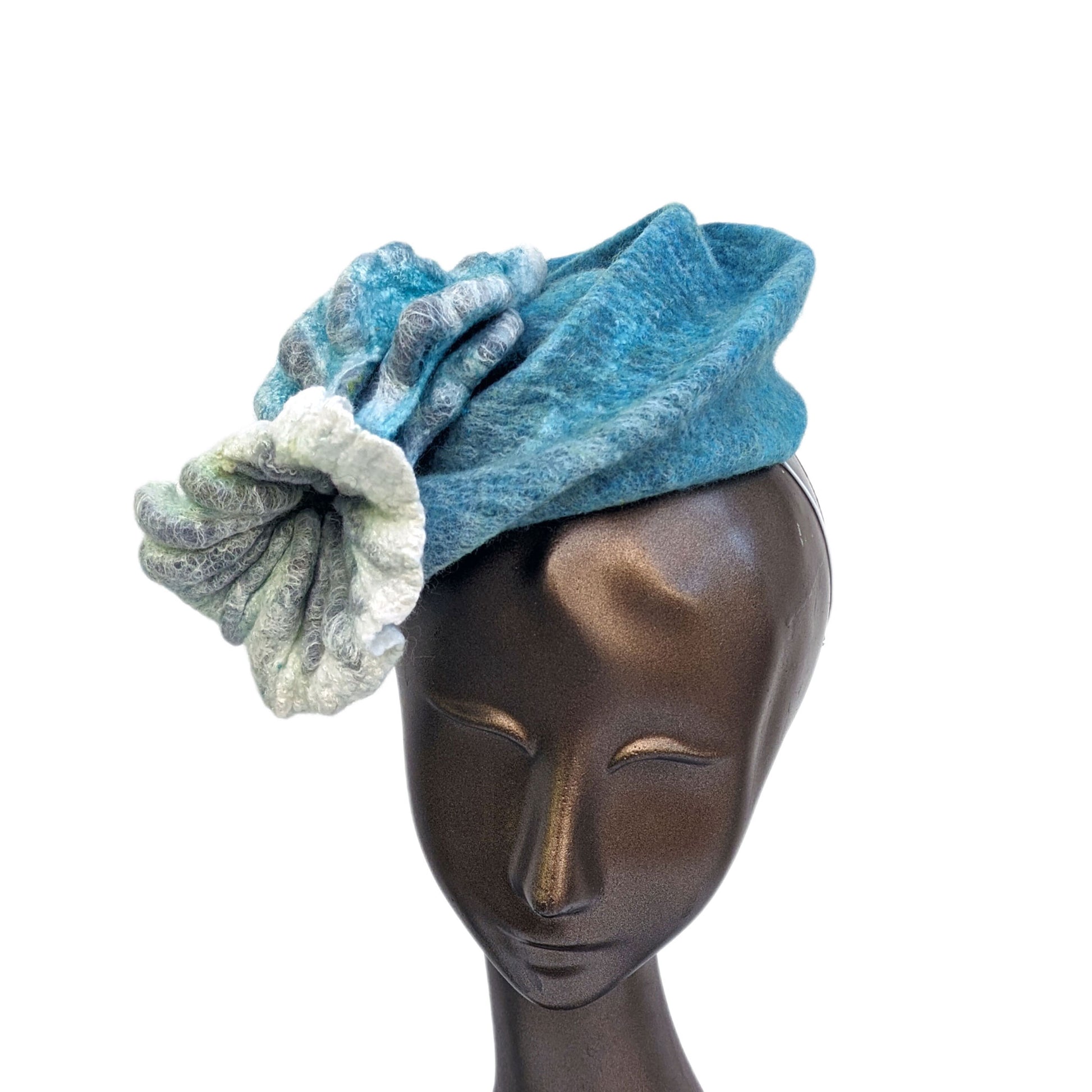 Variegated Blue Green Fascinator with Felted Floral Pod -front view