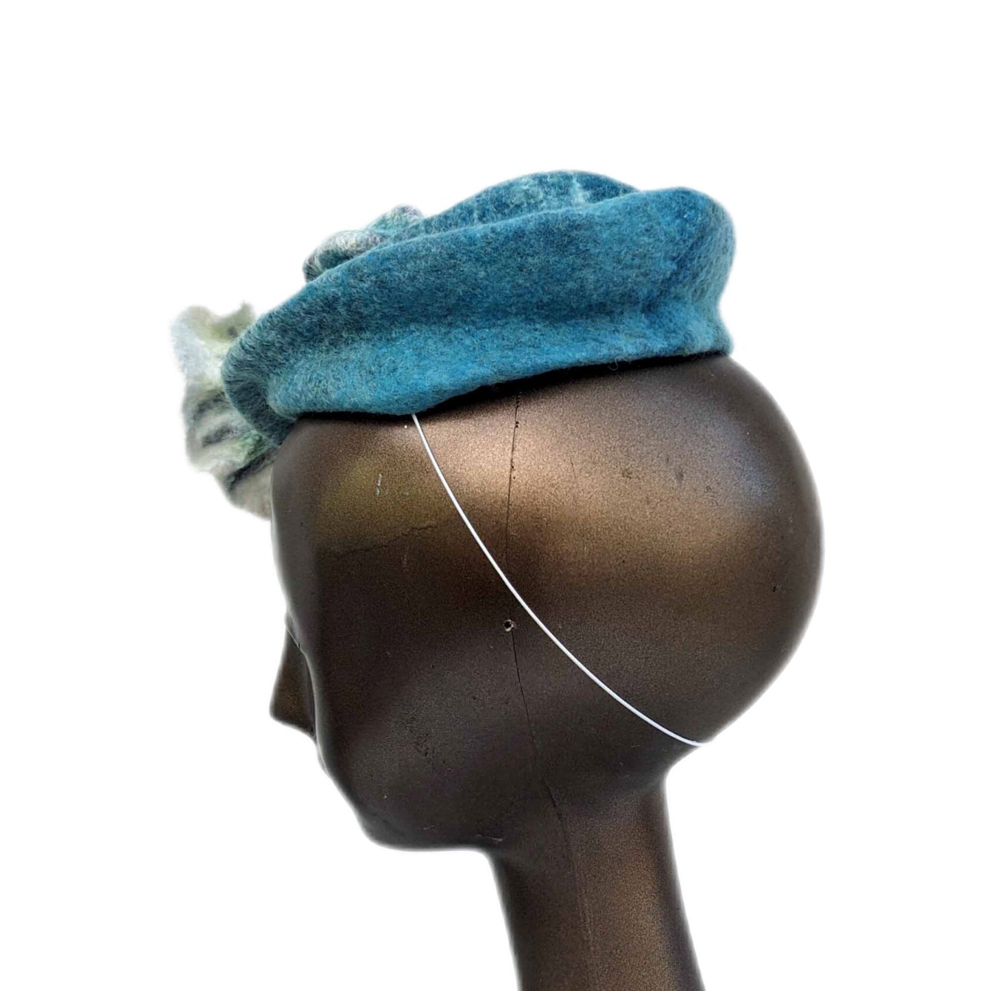 Variegated Blue Green Fascinator with Felted Floral Pod - side view