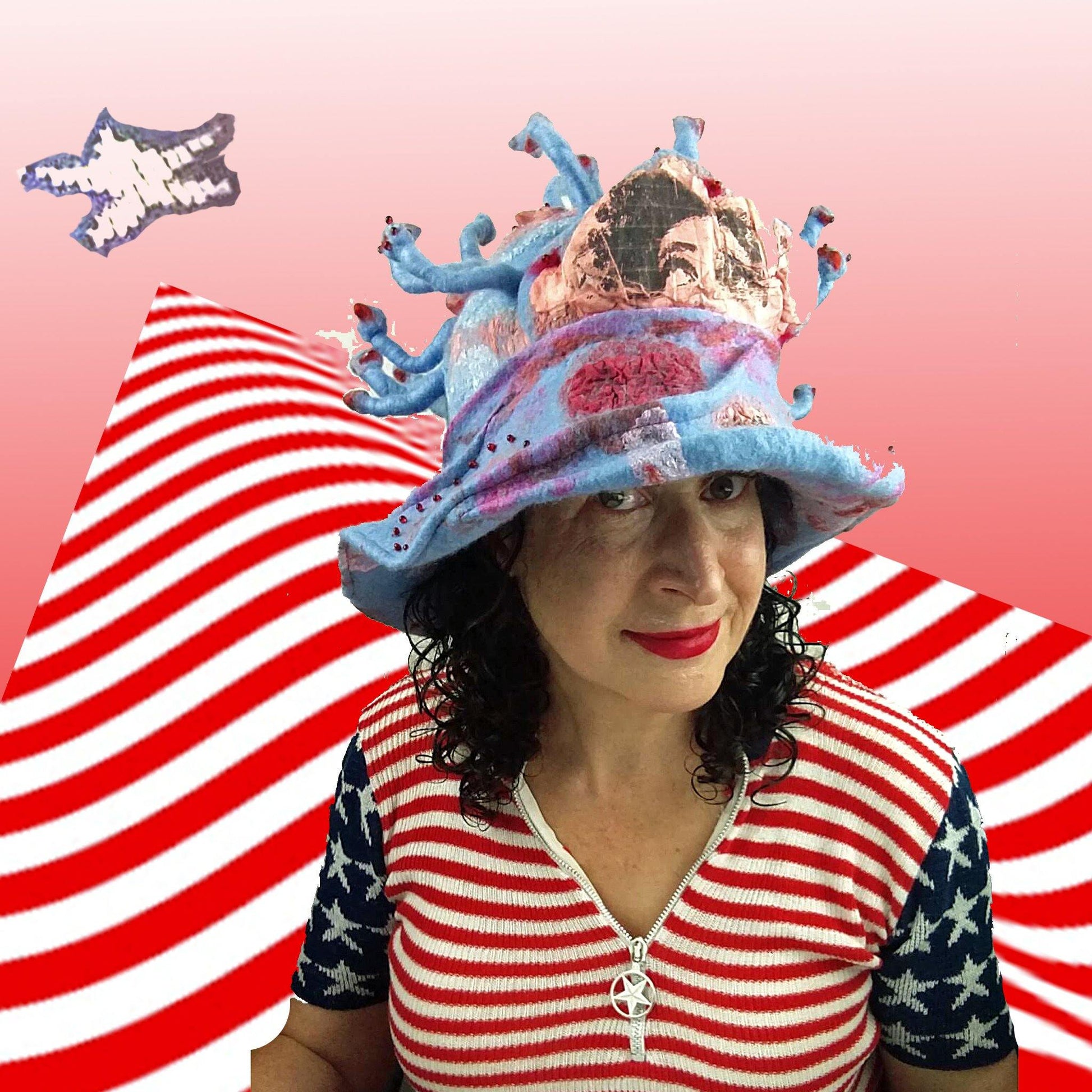 Pale Blue and Pink Hat inspired by Coronavirus with Eyes on it, worn by woman in USA flag inspired shirt.