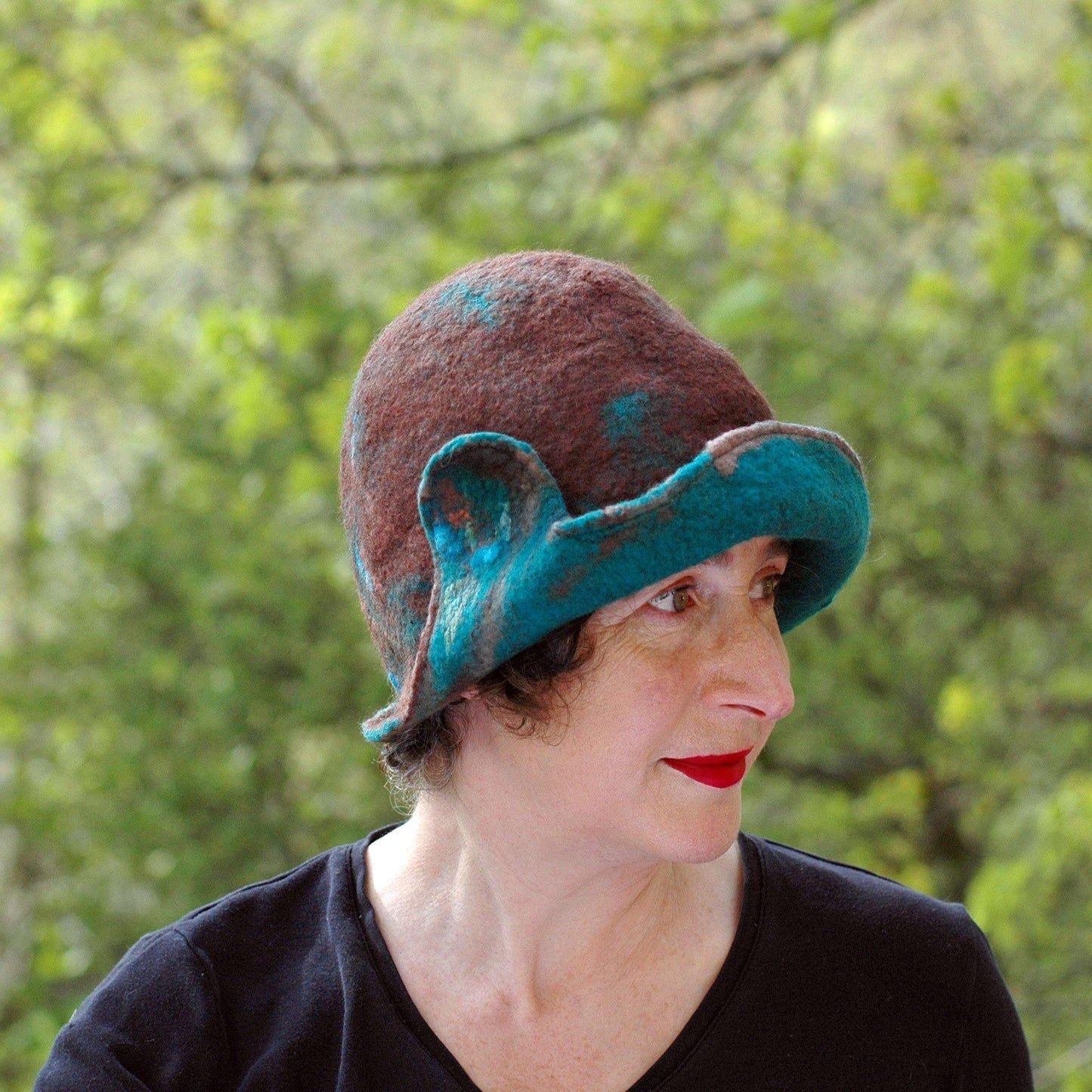1920s Style Brown Felted Cloche with Emerald Green Brim - side view outdoors.
