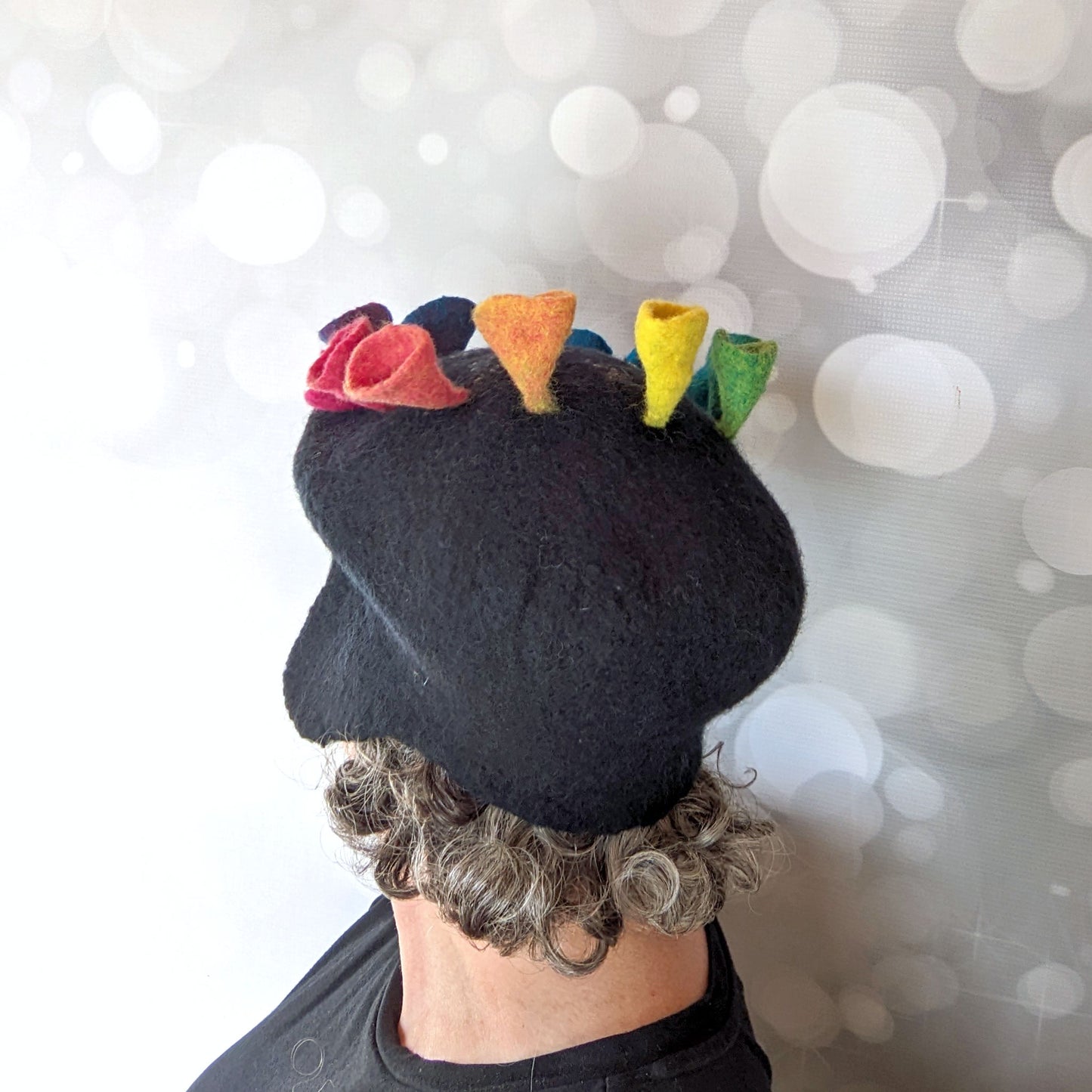 Black Felted Newsboy Cap with Rainbow Fungi - back view