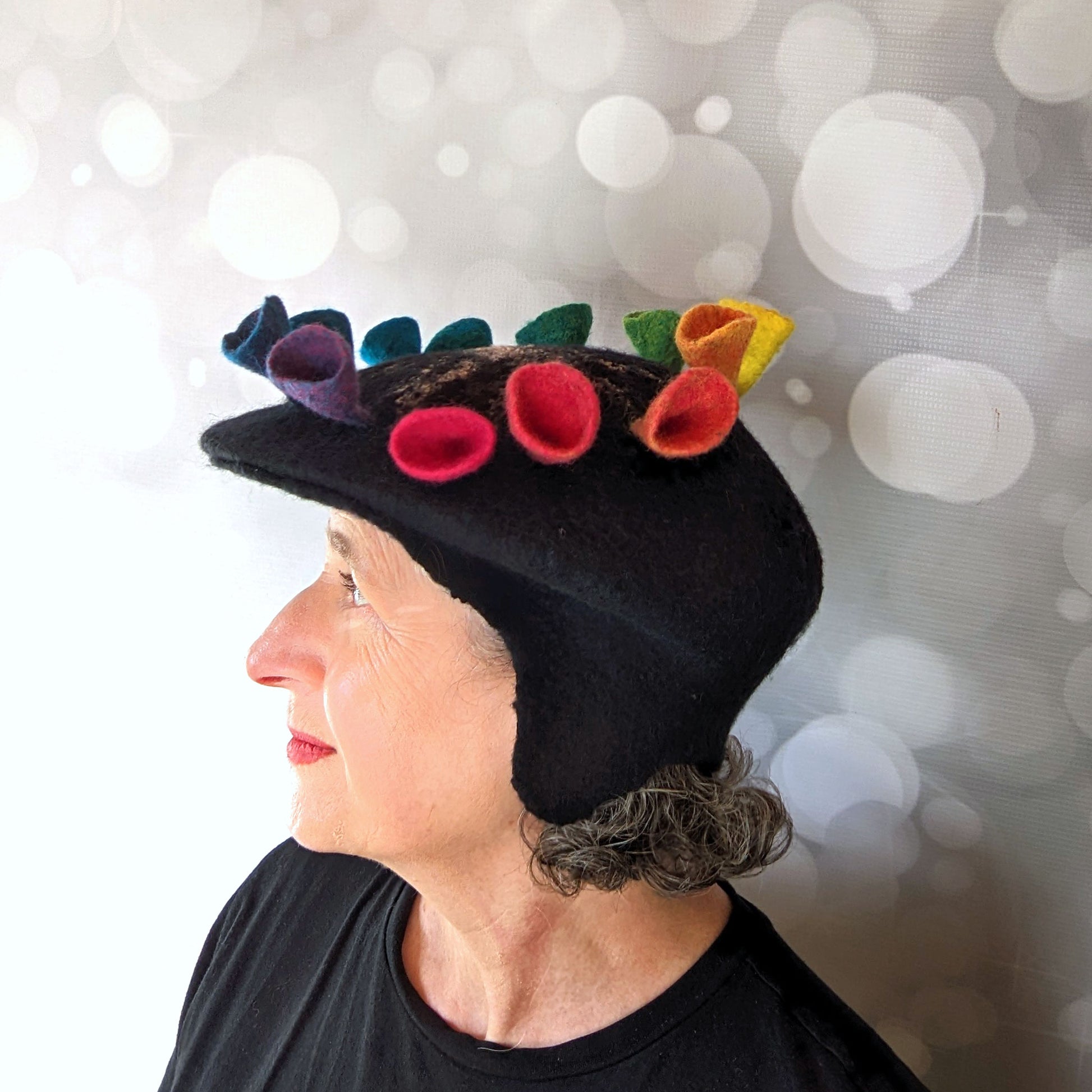 Black Felted Newsboy Cap with Rainbow Fungi - side view