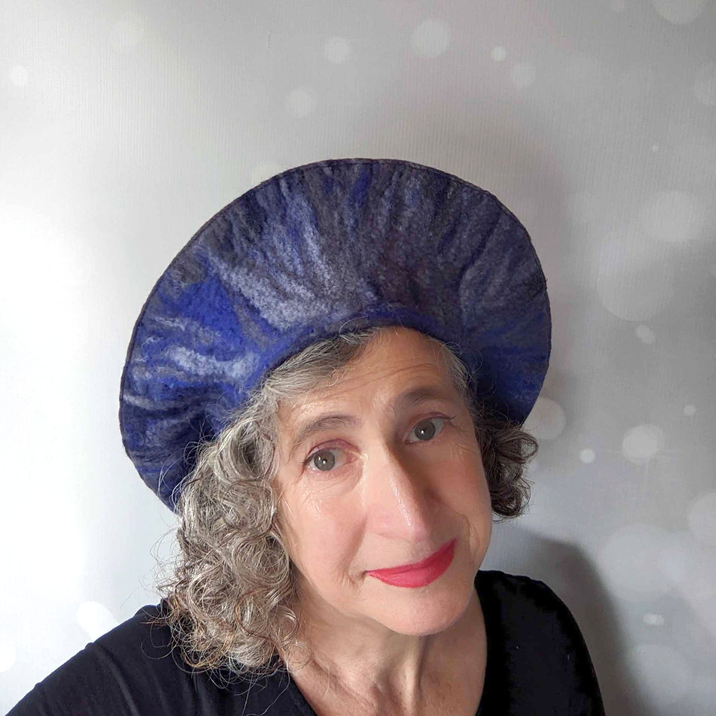 Blue and Gray Curlicue Beret - flipped back, halo style
