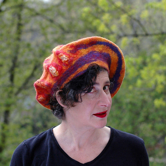 Circus-Style Yellow, Red and Blue Striped Beret against the trees
