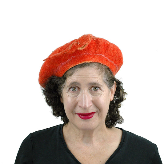 Orange Colored Beret with Felted Seed Pod - front view