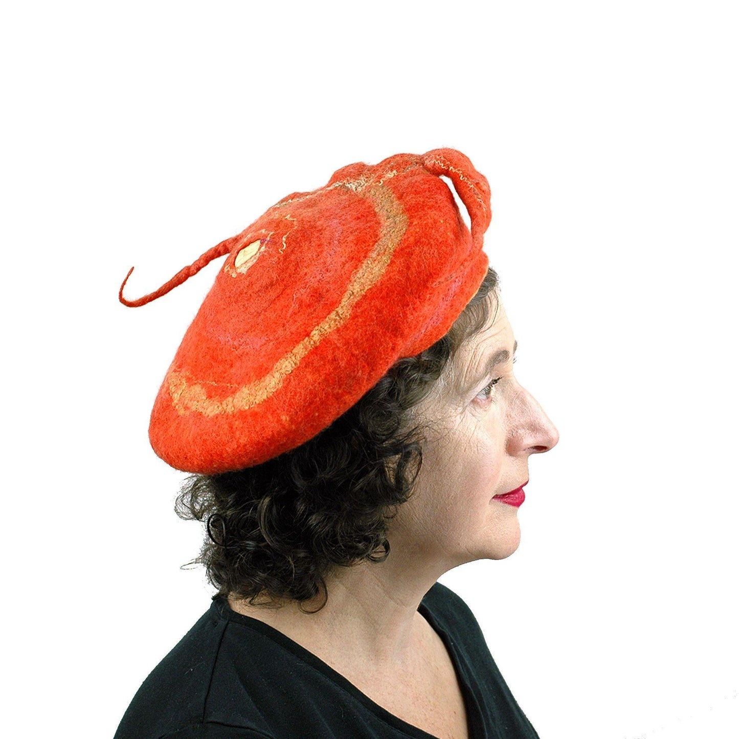 Orange Colored Beret with Felted Seed Pod - side view