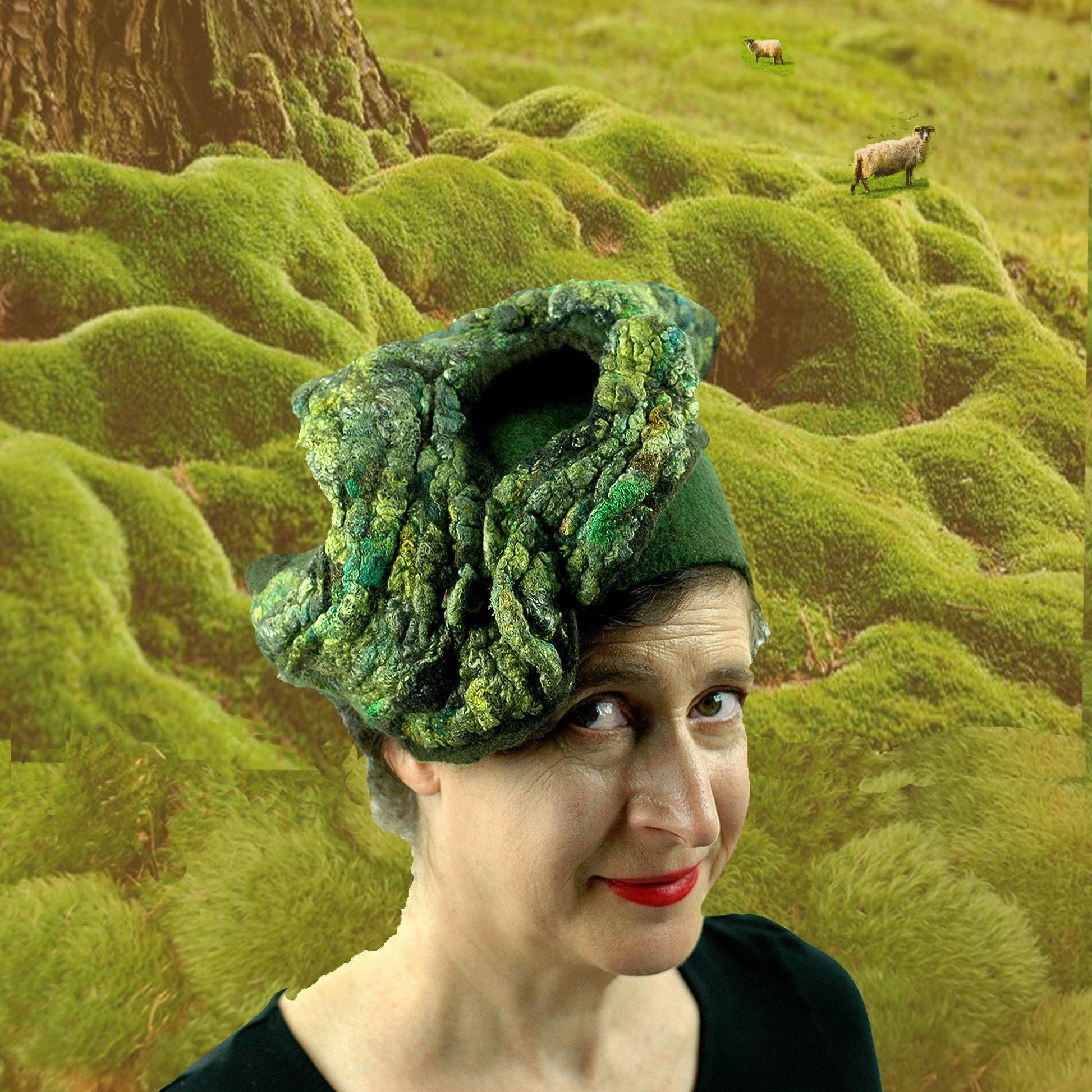 Green Pillbox felted hat against a collaged bed of soft green moss.
