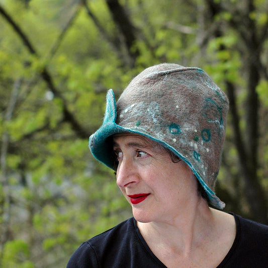 Felted Light Brown Highland Style Cloche - photographed in front of trees