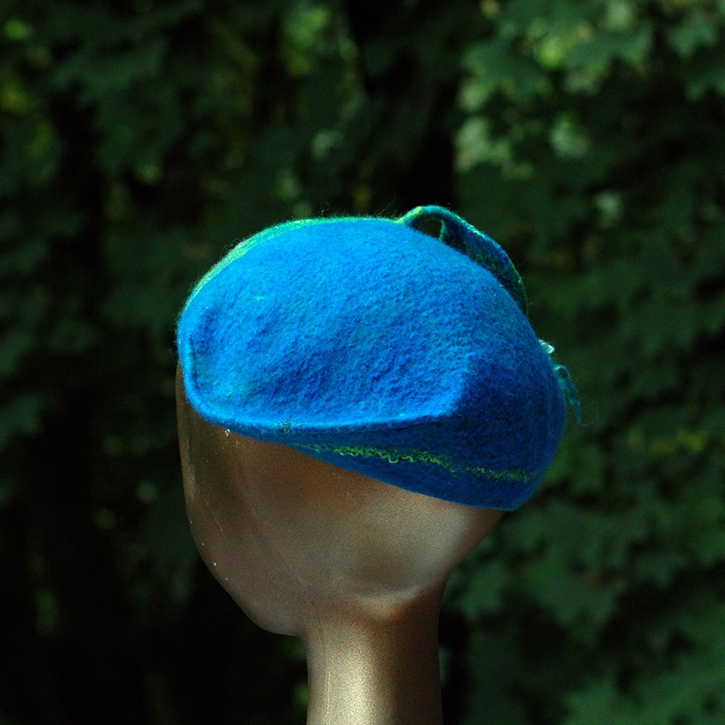 Teal Felted Cap with Stylized Peacock Feathers - back view
