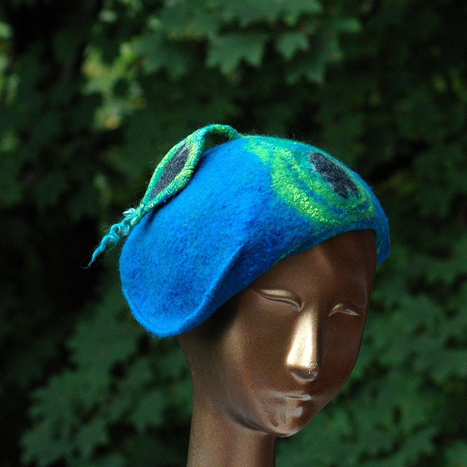 Teal Felted Cap with Stylized Peacock Feathers - front view