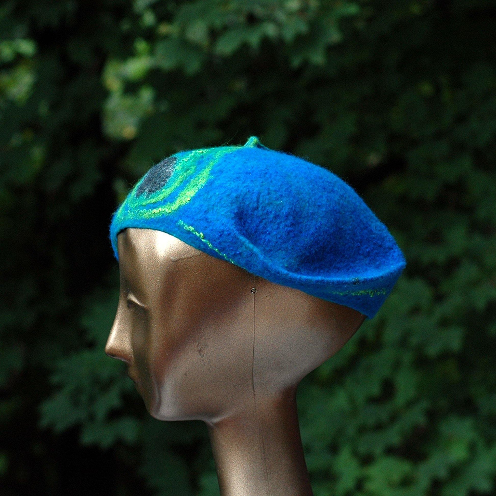 Teal Felted Cap with Stylized Peacock Feathers - side view