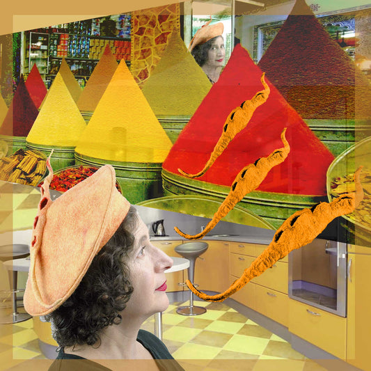 Tumeric Yellow Felted Beret -digitally setinto a yellow kitchen with pyramids of spices.
