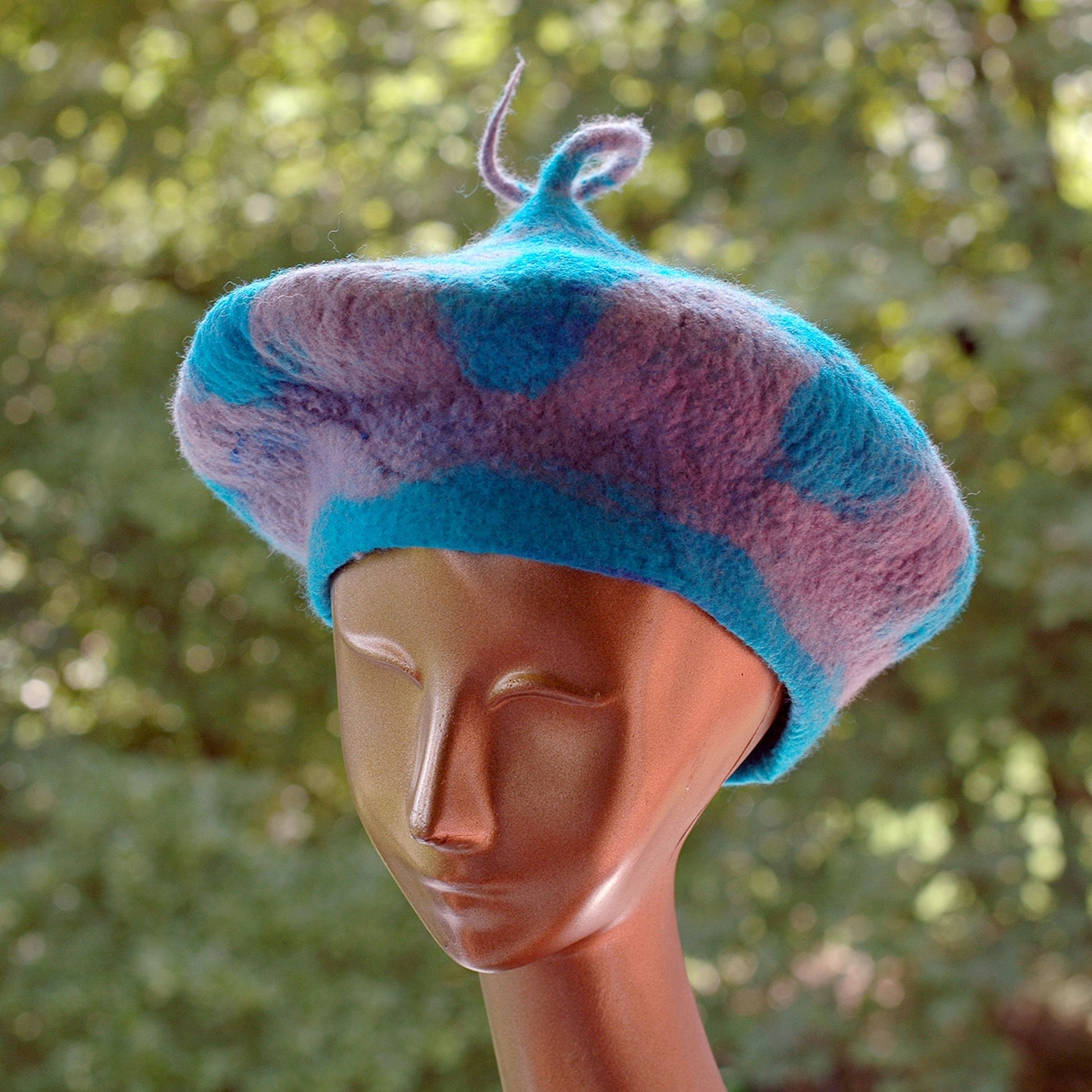 Turquoise and Gray Beret with Curly Stem - three quarters view