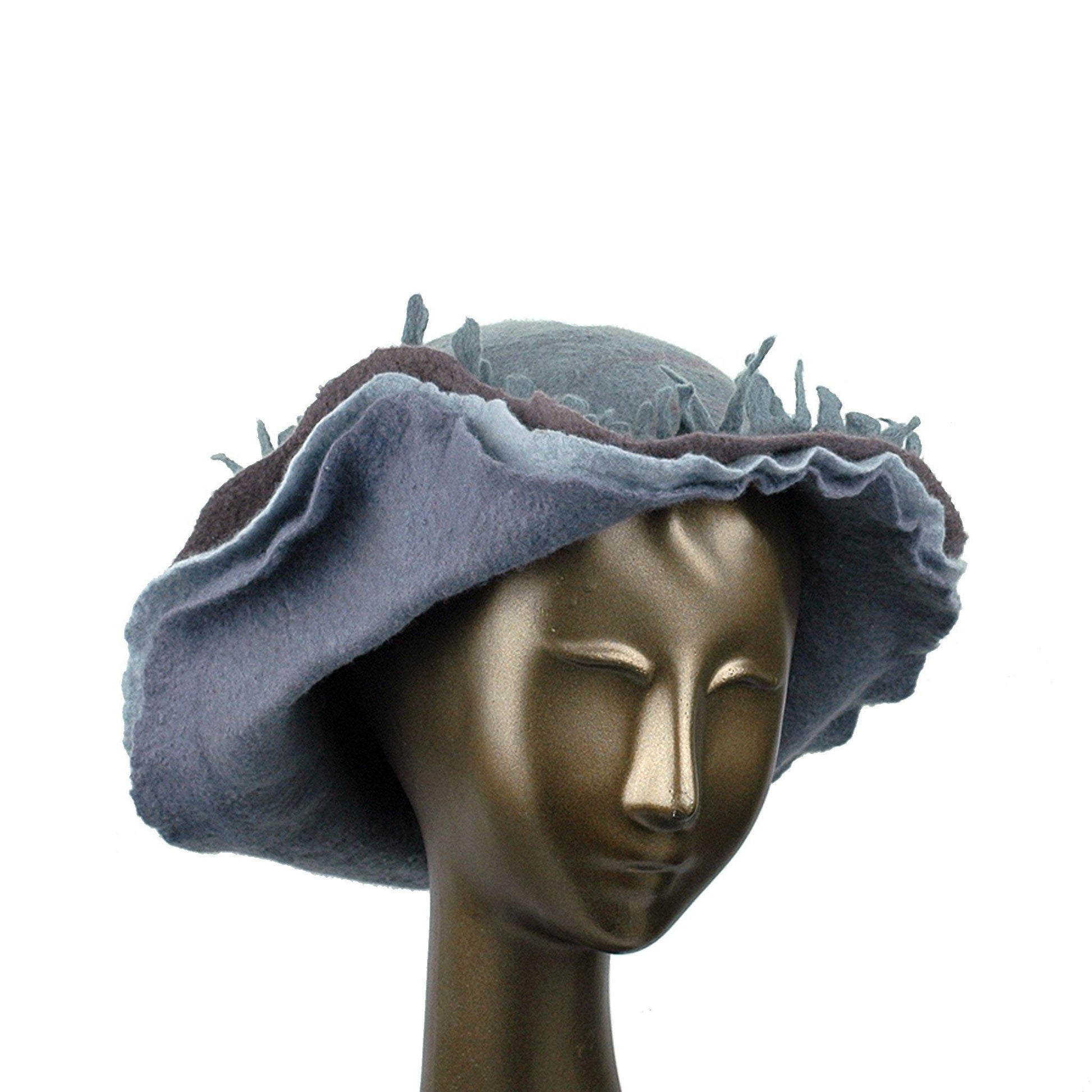 Wide Brimmed Felted Hat with Fringe in Neutral Colors - three quarters view